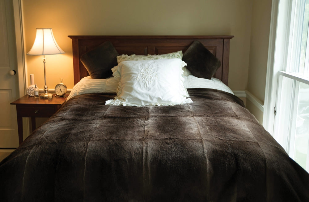 Custom Fur Blanket  on bed wth white pillow